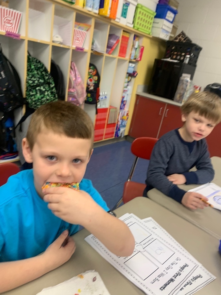 Connor is enjoying his cookies & cream donut! 
